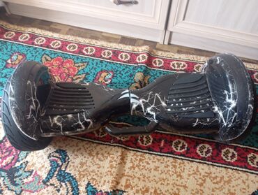 заредное устроиства 36в 2 а: Гироскутер в черном цвете с уникальным дизайном в виде белых "молний"