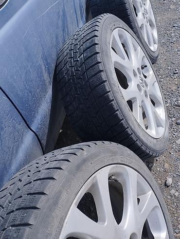 385 55: Комплект из 4 легкосплавных дисков Mazda с шинами. 5*114 — 7