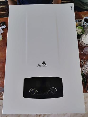 kohnə soyuducularin satisi: Nobella 60kw ikinciel ideal veziyetde. Nobella LUXE divar tipli qaz — 1