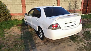 рул: Mitsubishi Lancer: 2006 г., 1.6 л, Автомат, Бензин, Седан — 2