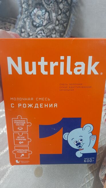 Другие товары для детей: Продам Нутрилак1 600гр. покупали дочке в России пили до 6 мес