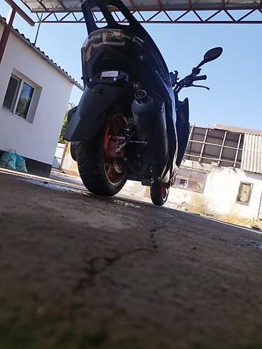 Скутеры: Скутер Da Wang DW8957 - Кузов: спортивный дизайн, цвет темно‑зеленый — 3