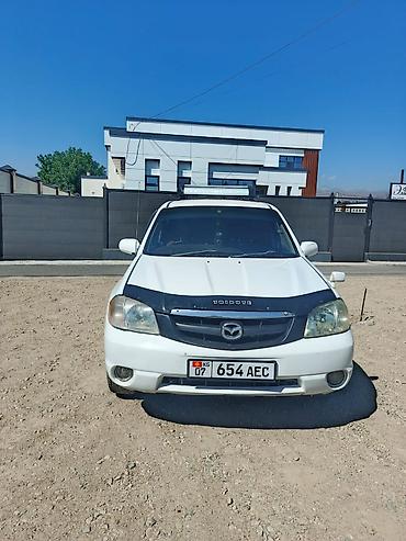 четырка цена: Mazda Tribute: 2002 г., 2 л, Автомат, Газ, Кроссовер — 1