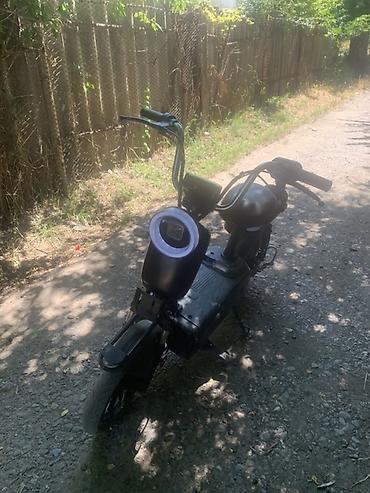 top riding: Электроскутер городского типа - Компоновка: низкая платформа для ног — 4