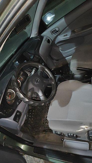 обшивка газ 53: Nissan Almera Classic: 2003 г., 1.5 л, Механика, Бензин, Седан — 5