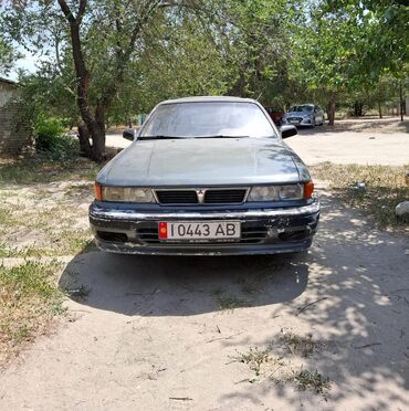 автомобиль нексия: Седан Mitsubishi Galant в сером цвете, оснащенный четырехдверным
