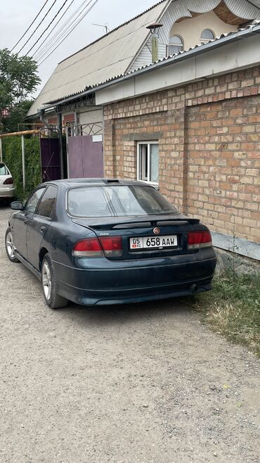 торф купить: Mazda 626: 1999 г., 2 л, Механика, Бензин, Седан