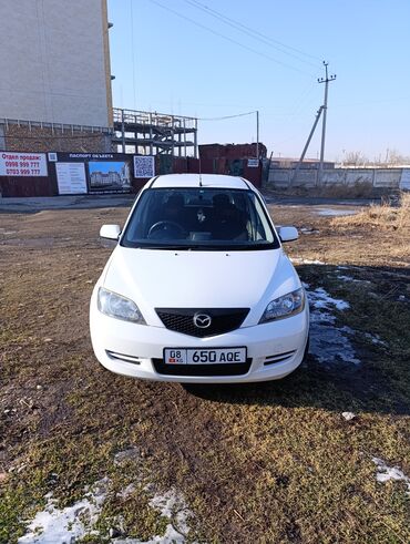 деми: Mazda Demio: 2004 г., 1.3 л, Автомат, Бензин, Седан