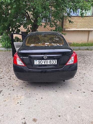 2012 07: Nissan Sunny: 1.5 l | 2012 il Sedan — 6