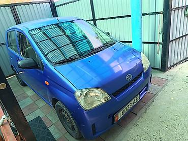 авто бак: Daihatsu Cuore: 2003 г., Механика, Бензин, Хэтчбэк — 1