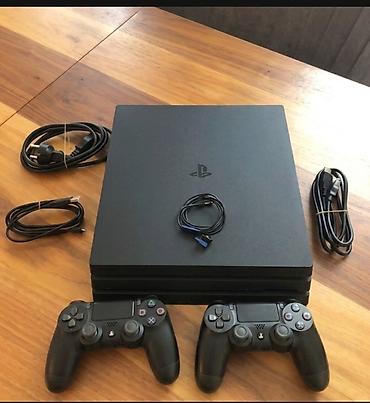 plazma telvizor per page 40: CUH-7216B — PS4 Pro-nun son versiyası 1TB yaddaş 2 ədəd orijinal pult — 1