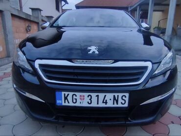 Peugeot: Crni Peugeot 308, kompaktan automobil pogodan za gradsku vožnju i duža — 10