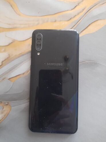 uzuz telfonlar: Samsung Galaxy A30s, 64 GB, rəng - Qara, Barmaq izi, Face ID