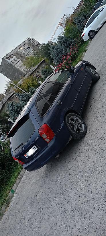 shevrolet lacetti: Mazda 323: 2003 г., 1.3 л, Механика, Бензин, Хэтчбэк — 3