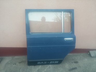 Auto delovi: Vrata zadnja leva Lada 2131 Niva. Polovno, ocuano. Skinuto sa — 1