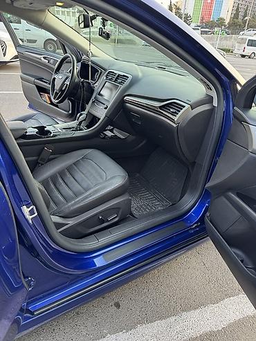 Транспорт: Ford Fusion sedan – mavi rəng, 4 qapı, ön və arxa park yerlərində — 10