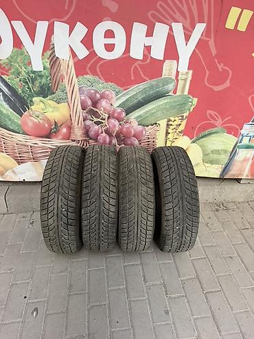 е 210: Комплект из 4 автомобильных шин. - Тип: зимние (симметричный — 2