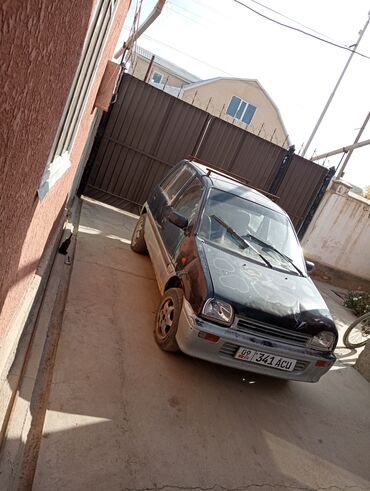 жип машина: Daihatsu Cuore: 1991 г., 0.8 л, Механика