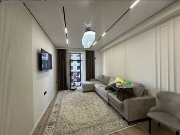 Logo Text: 2 комнаты, 72 м², 14 этаж, Дизайнерский ремонт