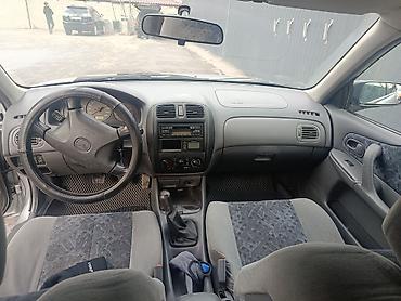 Mazda: Mazda 323: 2000 г., 1.5 л, Ручные, Бензин, Хэтчбэк — 13