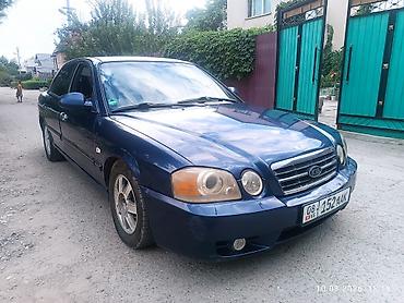 выбор номера о: Kia Magentis: 2003 г., 2 л, Механика, Бензин, Седан — 1