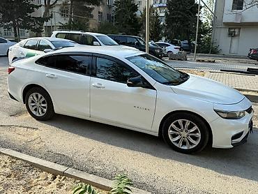 Chevrolet: Chevrolet Malibu – ağ rəngli, sedan kuzov. Xüsusiyyətlər: - — 3