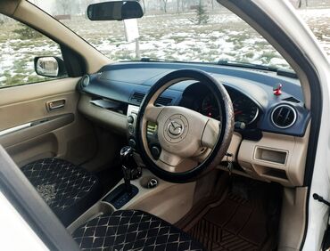 кол такси номер: Mazda Demio: 2005 г., 1.5 л, Автомат, Бензин, Хэтчбэк