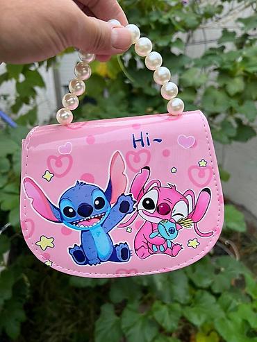 Rančevi, torbe i koferi: Torbice 1500

00din — 2