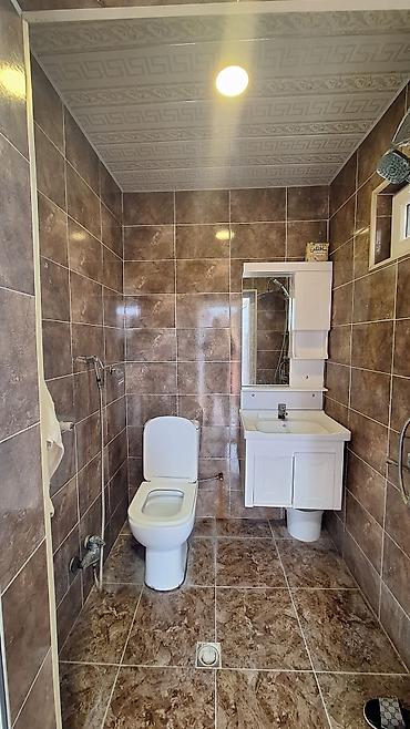 turkan evler: 3 otaqlı mənzil – geniş zal, iki yataq otağı və ayrı mətbəx — 6