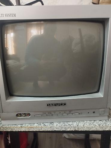sim kartli saat: Daewoo kineskop televizoru – Multi System - Ekran: təxminən 14–15 — 1