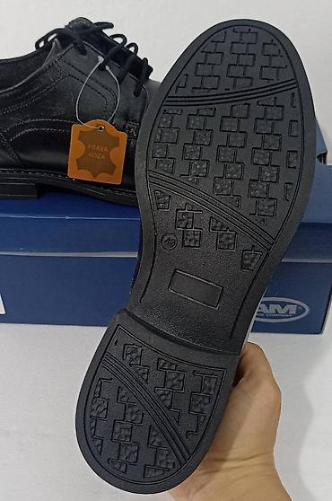 Cipele: Kožne crne cipele – broj 43,Cena: 4990 din (naznačeno na slici). - — 10