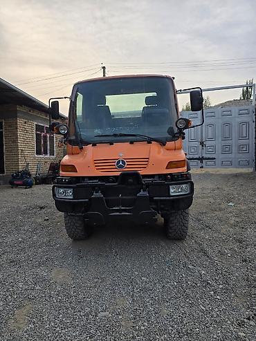 Другой строительный транспорт: Mercedes-Benz Unimog U400 (оранжевый) - Полный привод 4x4, высокие — 1