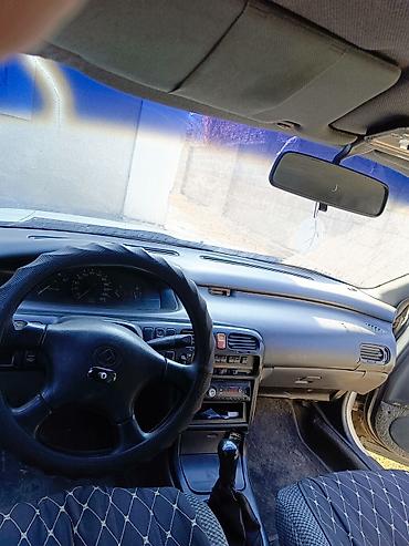 авто портер: Mazda Cronos: 1992 г., 1.8 л, Механика, Бензин, Седан — 4
