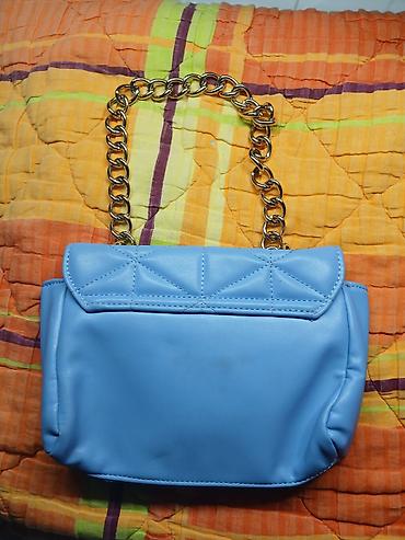 Torbe: Plava torbica-1500din Kožna torbica(čista koža)-2000din — 2