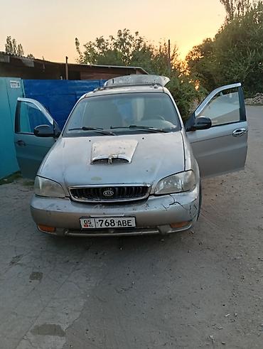 Kia: Kia Carnival: 1998 г., Минивэн — 12