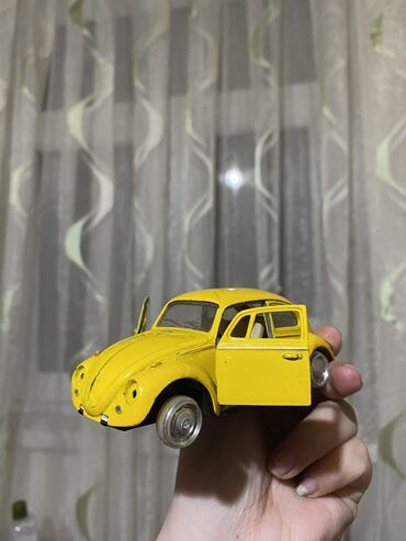 Uşaqlar üçün digər mallar: |- Volkswagen Beetle model -| Sarı rəngdə olan bu Volkswagen Beetle