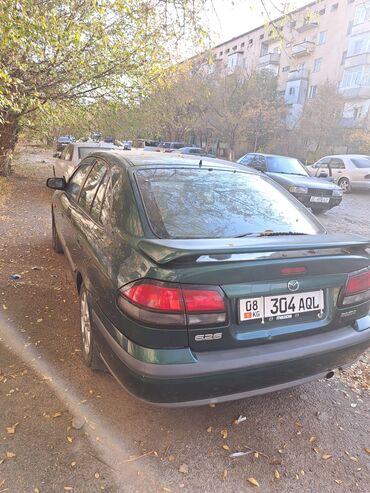 скутер обмен: Mazda 626: 1999 г., 2 л, Автомат, Бензин