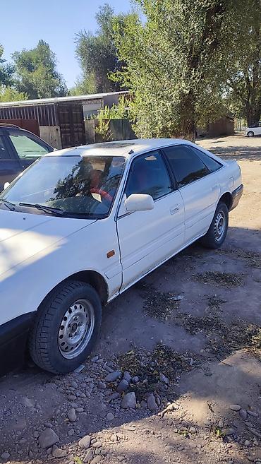 митсубиси спайк стар: Mazda 626: 1989 г., Механика, Седан — 7