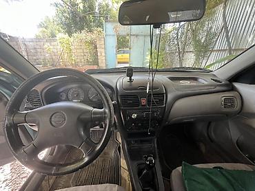 ford avtomobilleri: Nissan Sunny: 1.6 l | 2002 il Sedan — 4