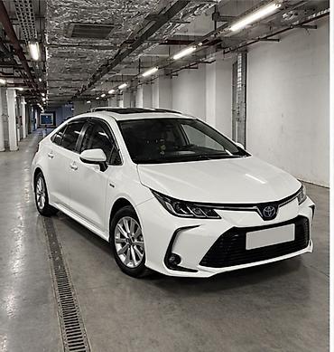 byd e1: Toyota Corolla: 2020 г., 1.8 л, Вариатор, Гибрид, Седан — 1