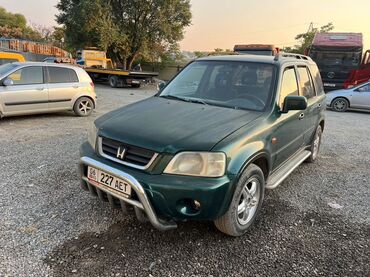 машина жип: Полноприводный внедорожник Honda CR-V темно-зеленого цвета. Автомобиль