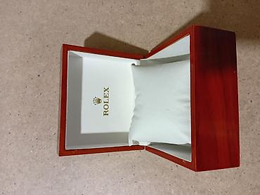 Принадлежности для часов: Məhsul: Rolex saat qutusu Təsvir: - Material: Parlaq cilalanmış ağac — 1