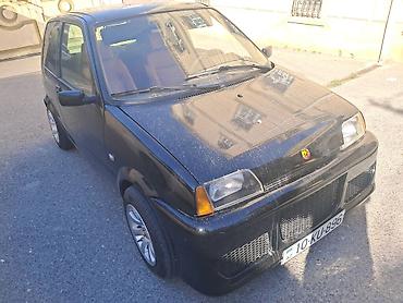 mebel fiat: Kompakt şəhər avtomobili – 3 qapılı hetçbek, qara rəng. Ekonomik və — 9