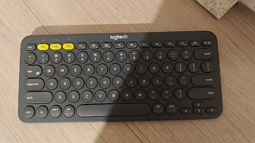 реальному: Клавиатура, Logitech, Мембранная, Bluetooth подключение, Размер: 75% — 1