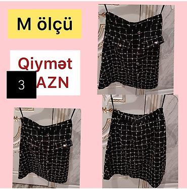 Paket geyimlər – hər biri 3 AZN 1) Qara ağ qəfəs naxışlı yubka -