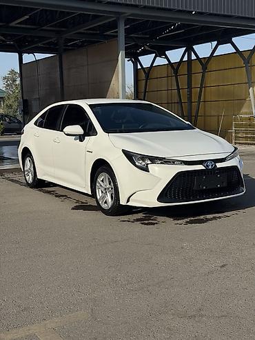 Транспорт: Toyota Corolla: 2023 г., 1.8 л, Вариатор, Гибрид, Седан — 2