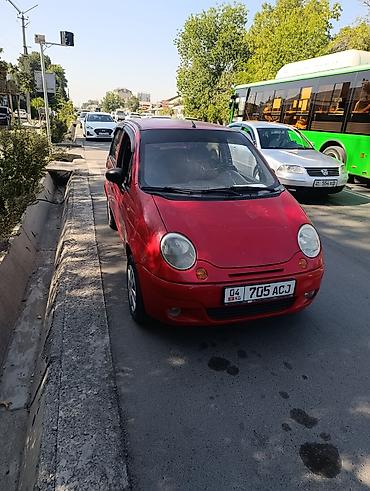 красный материал: Daewoo Matiz: 2003 г., Механика, Бензин, Хэтчбэк — 1
