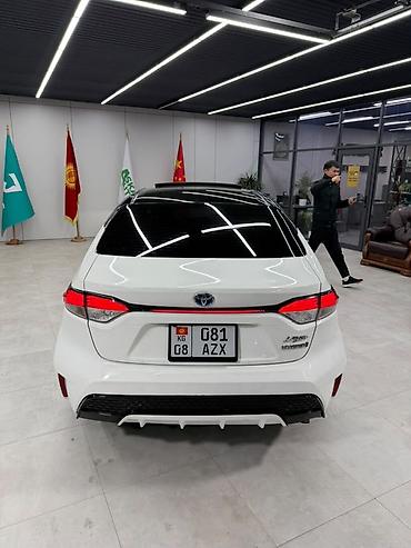 королла версо 2005: Toyota Corolla: 2022 г., 1.8 л, Гибрид, Седан — 4