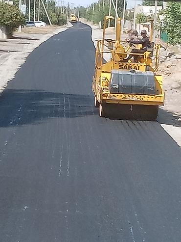 Коммунальная и дорожная техника: Услуги по укладке асфальта для создания прочных и долговечных дорожных — 5