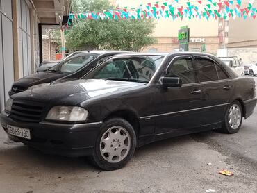 Mercedes-Benz: Mercedes-Benz 220: 2.2 l | 1995 il Sedan